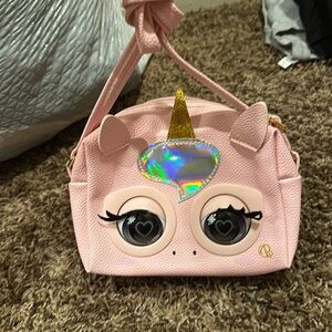 Girls purse with moving cat eyes